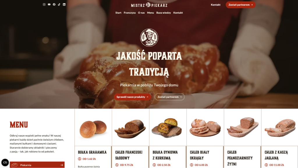Sekcja hero strony internetowej Mistrz Piekarz (sieć piekarni/food trucków franczyzowych) z tekstem 'Jakość poparta tradycja' i zdjęciem świeżego chleba